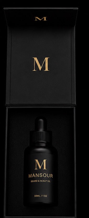 MANSOUR bottle in open gift box